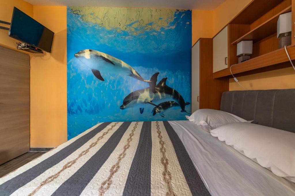 Posteľ alebo postele v izbe v ubytovaní Apartments Ribarević