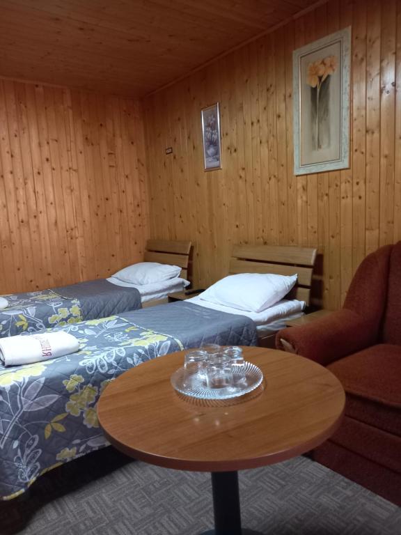 Postel nebo postele na pokoji v ubytování Urochyshe Vyshnya
