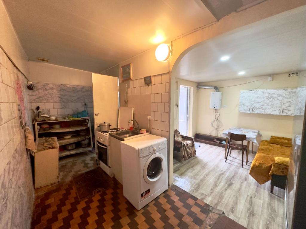 Kuchyň nebo kuchyňský kout v ubytování NunSon Guest House