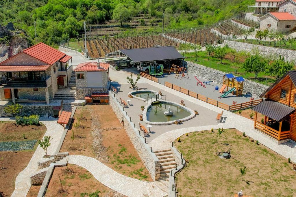 an aerial view of a park with a playground at Vinogradina Eco Vukčević in Virpazar