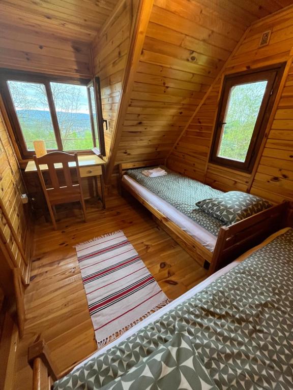 Posteľ alebo postele v izbe v ubytovaní Izdebka na Podchybiu