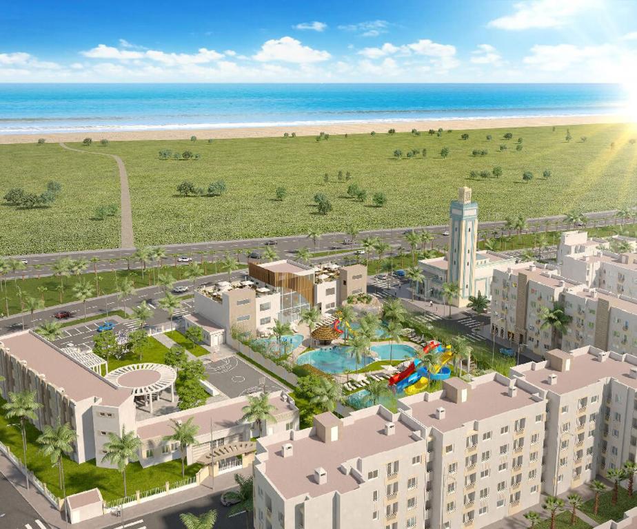 an aerial view of a resort with the beach at joli appartement près de la mer in Casablanca