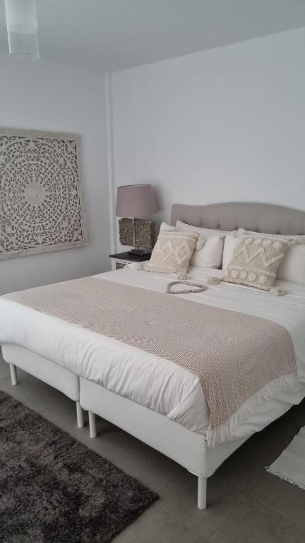 Postel nebo postele na pokoji v ubytování Casa volcanes