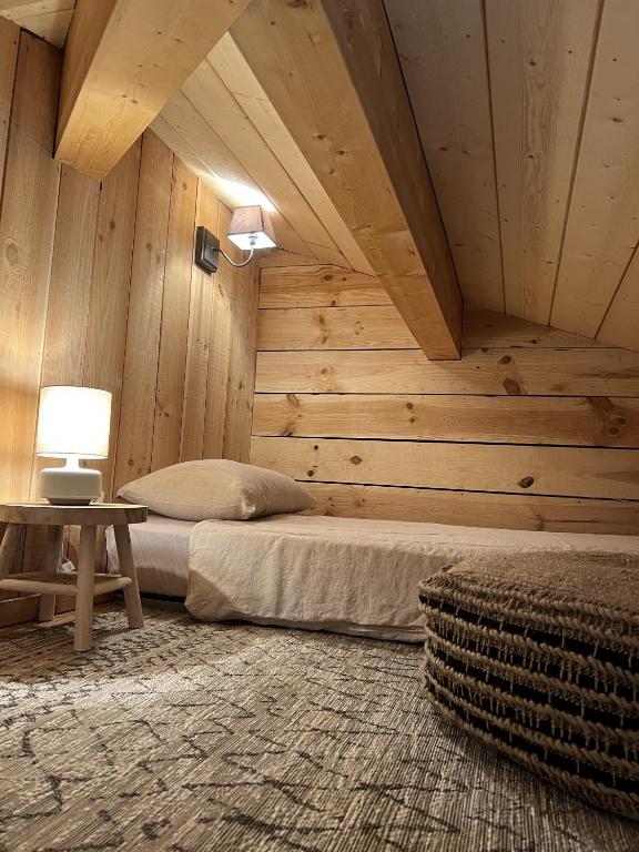 Postel nebo postele na pokoji v ubytování VillaCanau