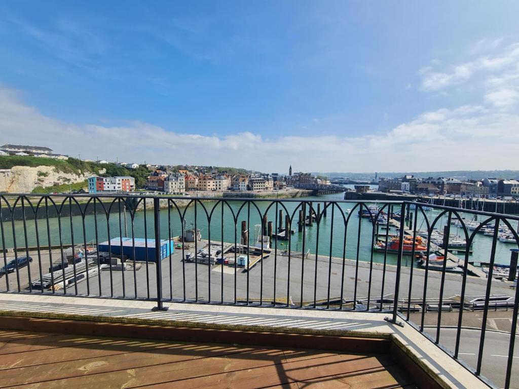 a view of a harbor with boats in the water at LA TOUR AUX CRABES près de la plage in Dieppe