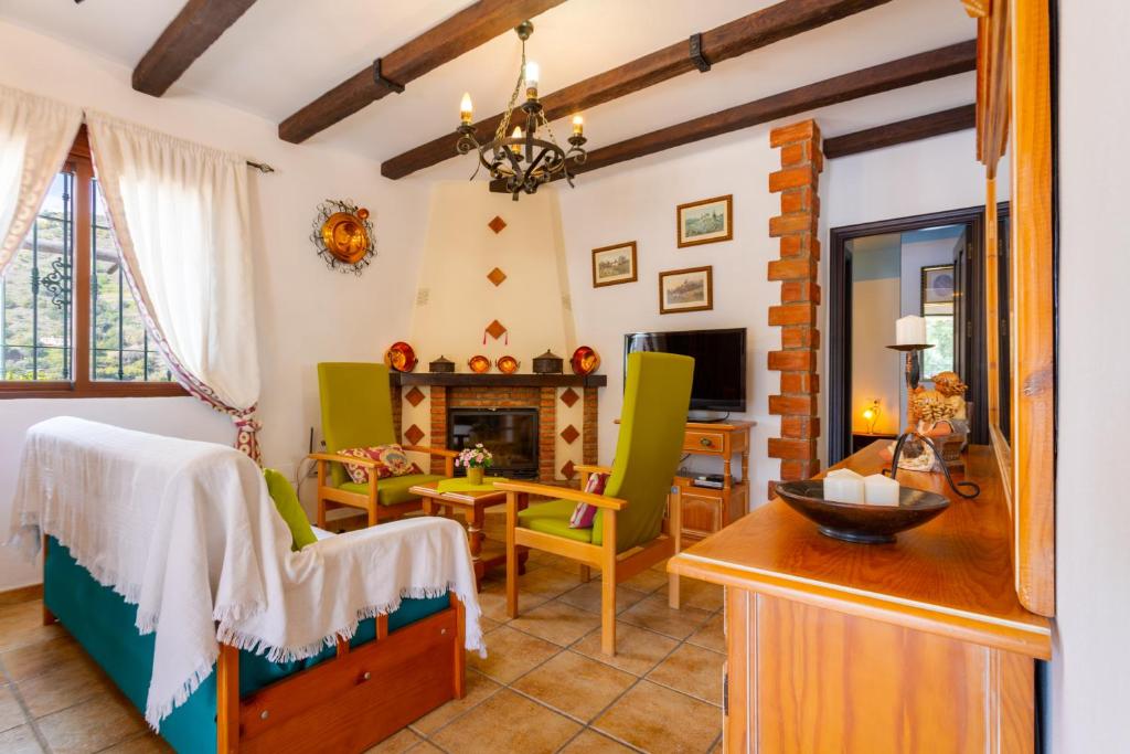 Postel nebo postele na pokoji v ubytování Cortijo La Reina