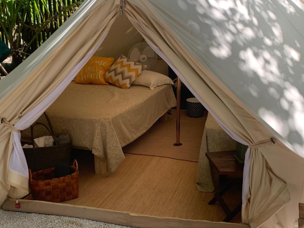 Postel nebo postele na pokoji v ubytování Casa Borush Tulum Glamping Fruit & Cenote Experience