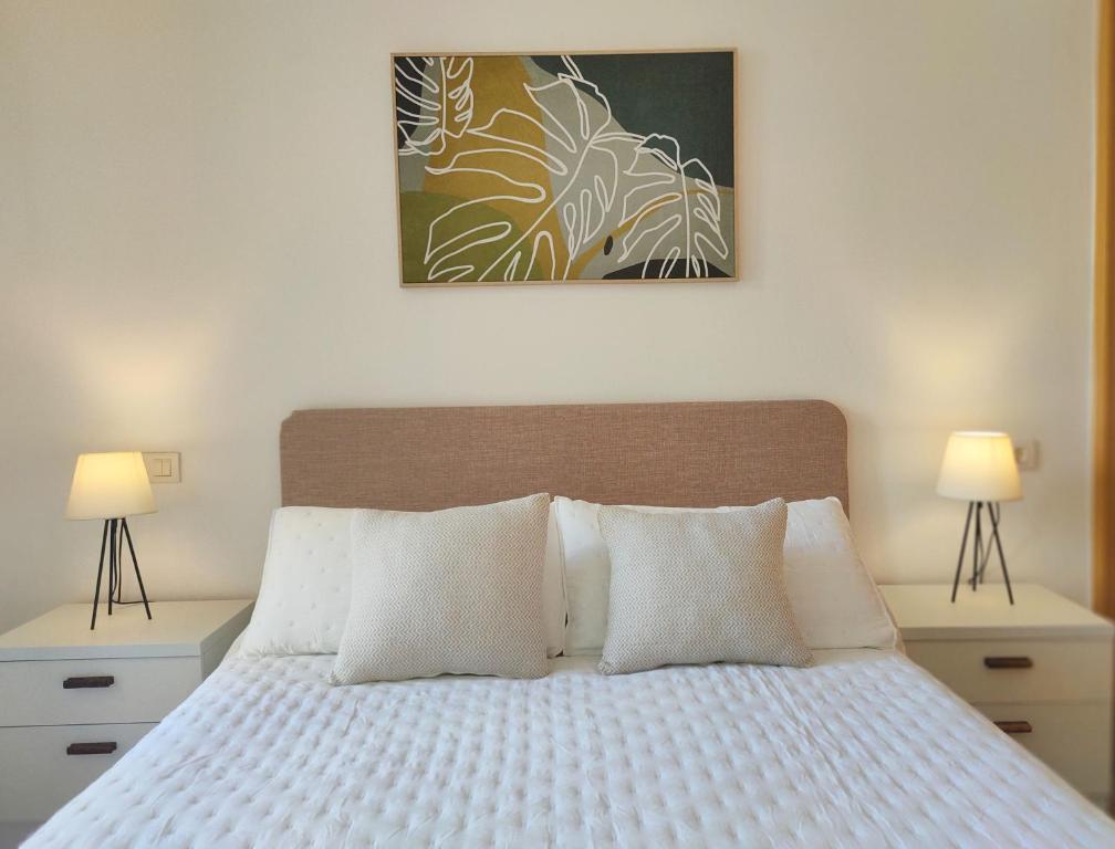 Postel nebo postele na pokoji v ubytování Casas de la Loma, Macenas Resort