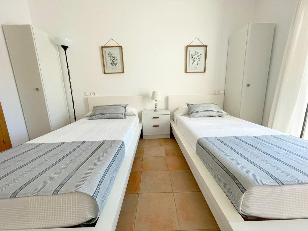 Postel nebo postele na pokoji v ubytování Casas de la Loma, Macenas Resort