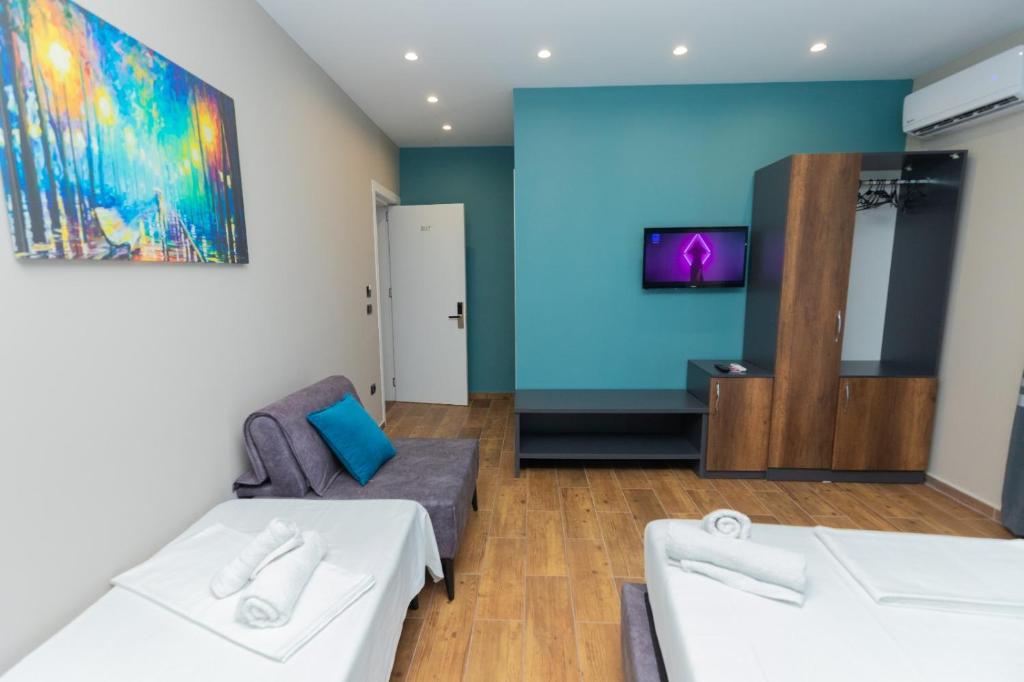 Postel nebo postele na pokoji v ubytování Hotel Viroi