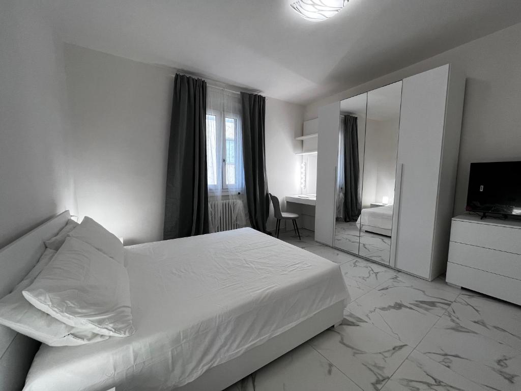 Katil atau katil-katil dalam bilik di a casa di Luca