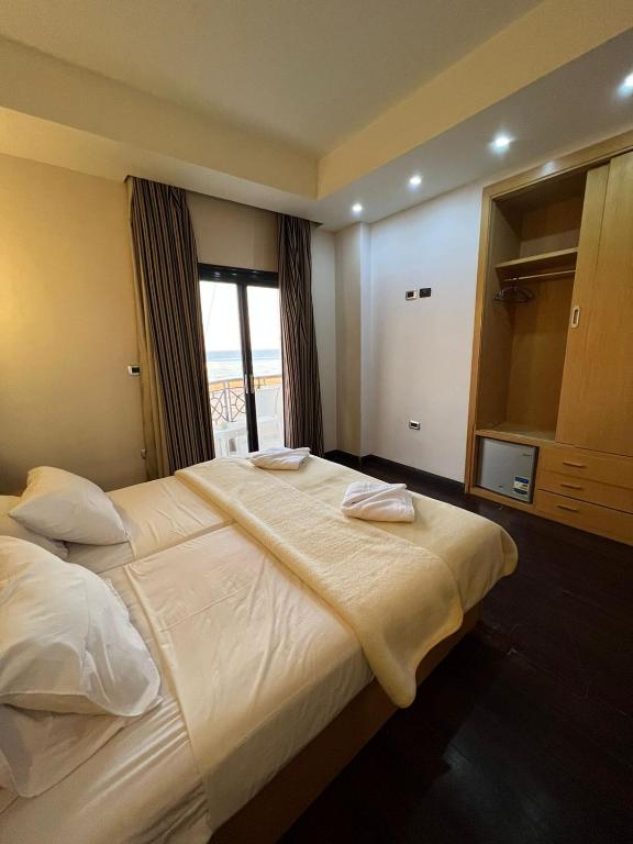Voodi või voodid majutusasutuse sea view house toas