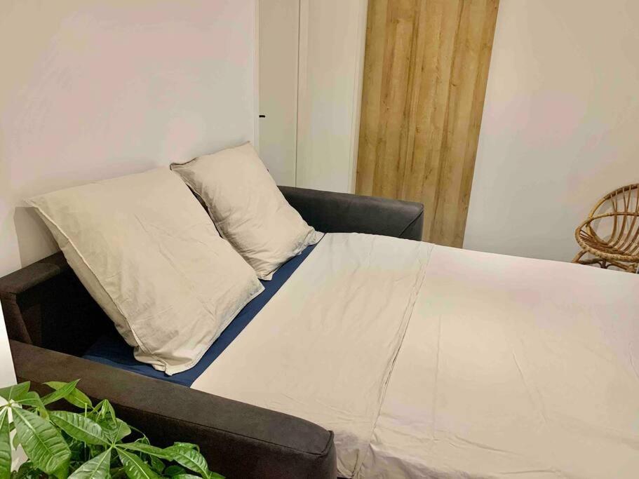 Posteľ alebo postele v izbe v ubytovaní Logement RDC dans centre ville de Sète classé 3*