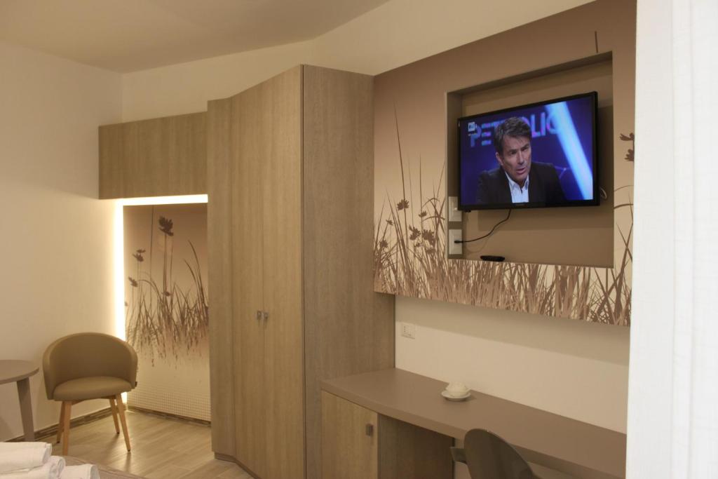 TV a/nebo společenská místnost v ubytování La Terrazza sul mare