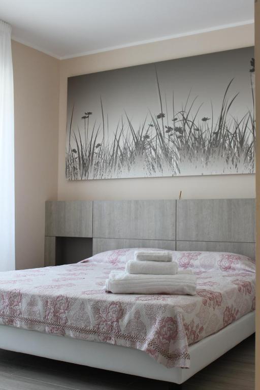 Postel nebo postele na pokoji v ubytování La Terrazza sul mare