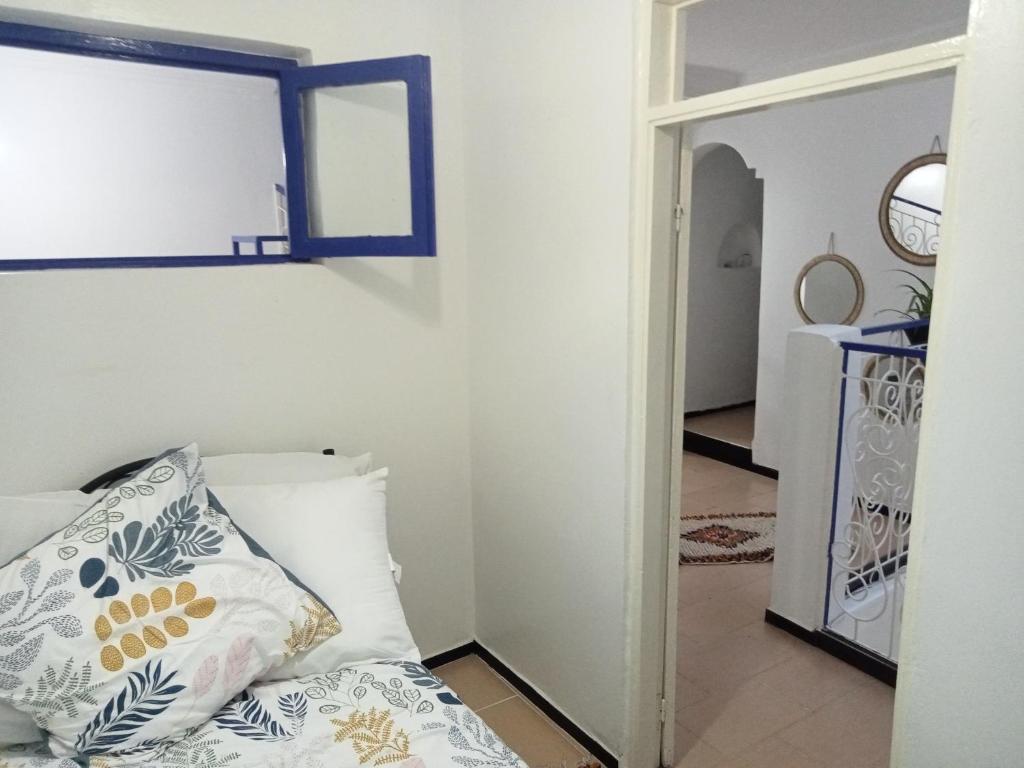 Postel nebo postele na pokoji v ubytování Dar Azam