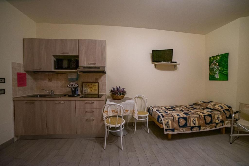 Kuchyň nebo kuchyňský kout v ubytování Residence Le stanze dei Visconti