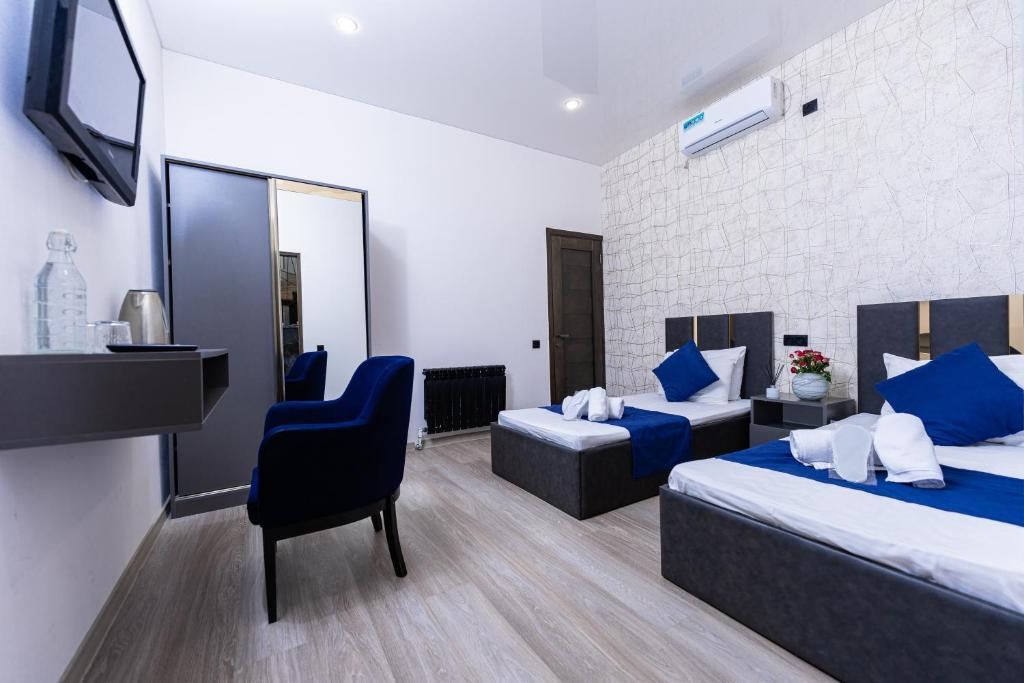 TV a/nebo společenská místnost v ubytování Bloom Hotel Yerevan