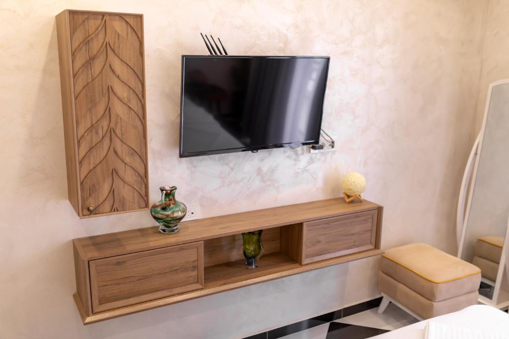 TV a/nebo společenská místnost v ubytování Baba's Hotel & Spa