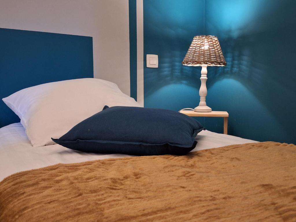 Postel nebo postele na pokoji v ubytování Gîte La Forge