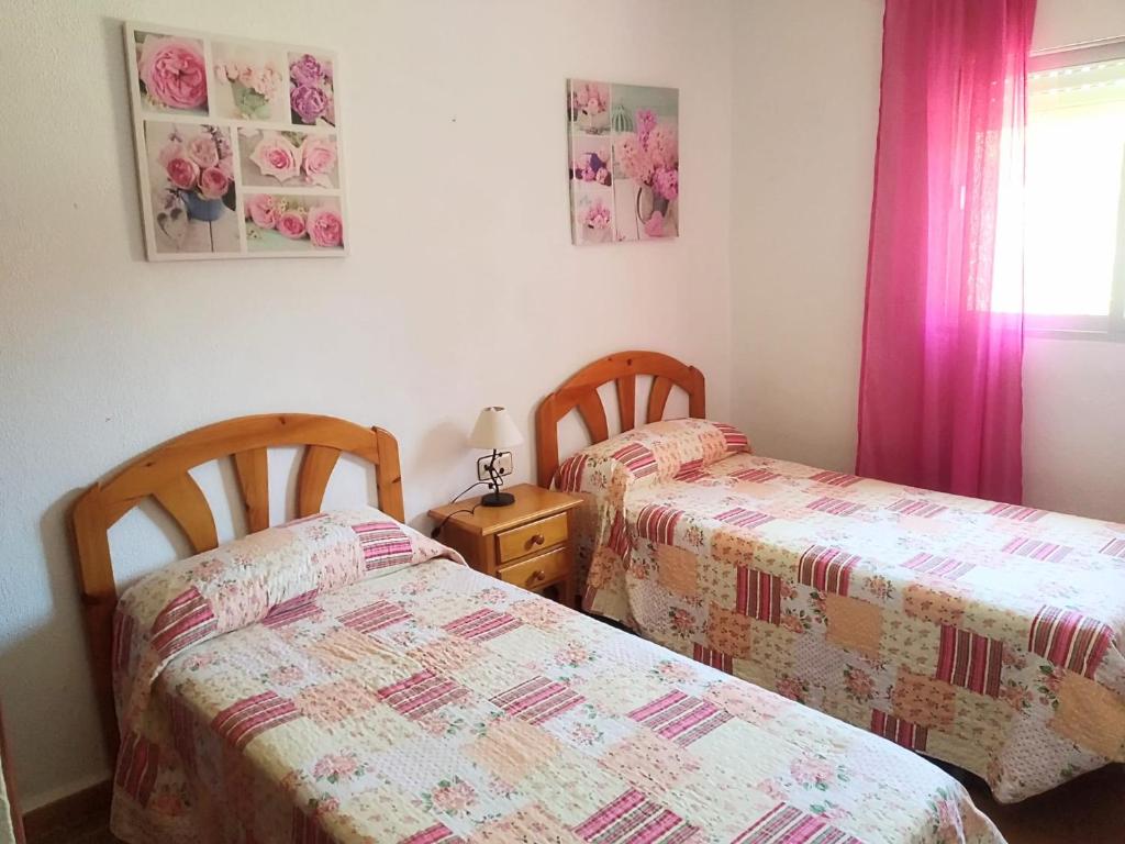 Posteľ alebo postele v izbe v ubytovaní Casa Rural El Laurel con piscina privada