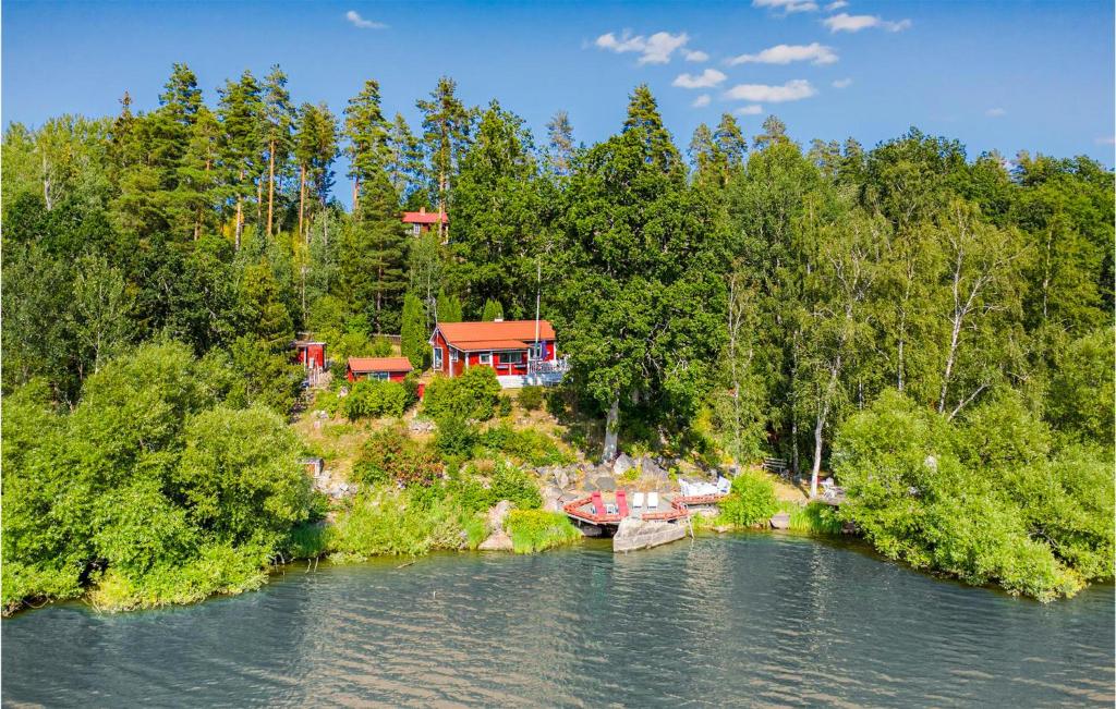 an aerial view of a house on the shore of a river at Awesome Home In Linkping With Wifi in Linköping