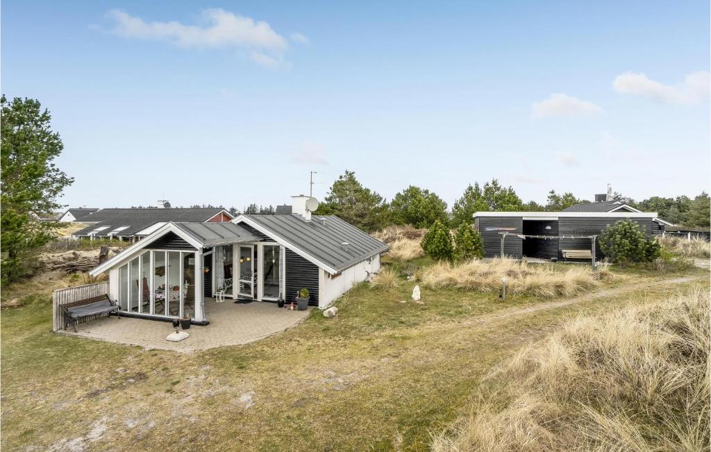 an overhead view of a small house on a hill at Holiday Home Grårisvej Thisted V in Nørre Vorupør