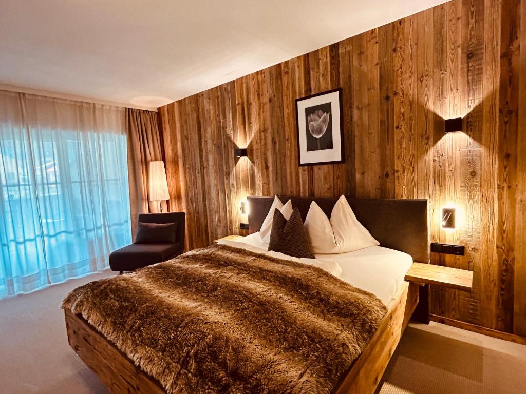 Postel nebo postele na pokoji v ubytování Sonn-Alm Chalet-Apartments
