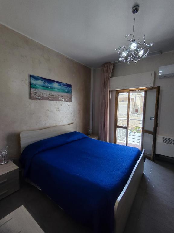 Postel nebo postele na pokoji v ubytování Albergo Primavera