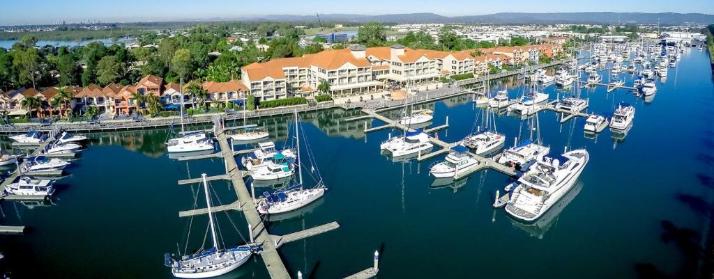 an aerial view of a marina with boats docked at Hope Harbour Hotel in Gold Coast