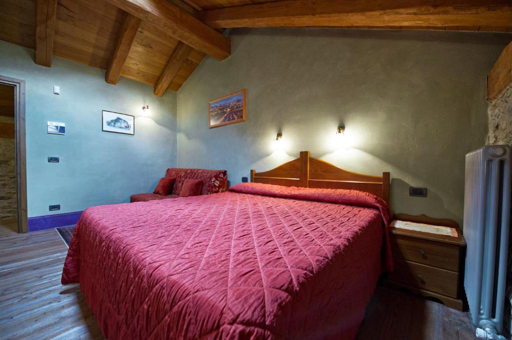 Postel nebo postele na pokoji v ubytování La Maison Des Vignerons Chambres D'Hotes B&B