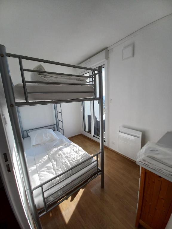Posteľ alebo postele v izbe v ubytovaní Balcon sur mer