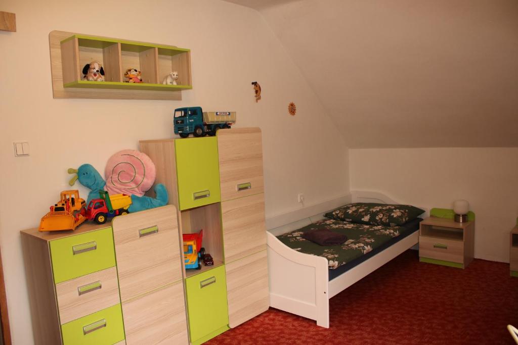 Postel nebo postele na pokoji v ubytování Chalupa Boskovice