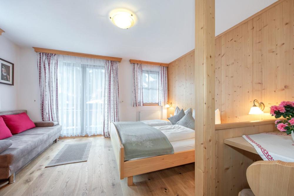 Postel nebo postele na pokoji v ubytování Oberkantiolhof