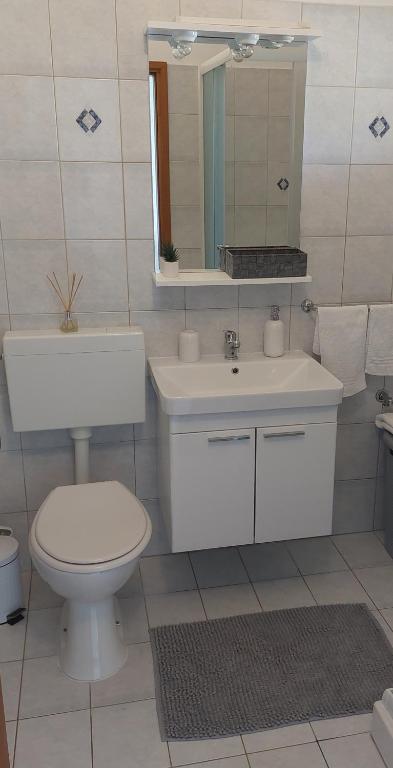 Koupelna v ubytování Apartments Ritoša