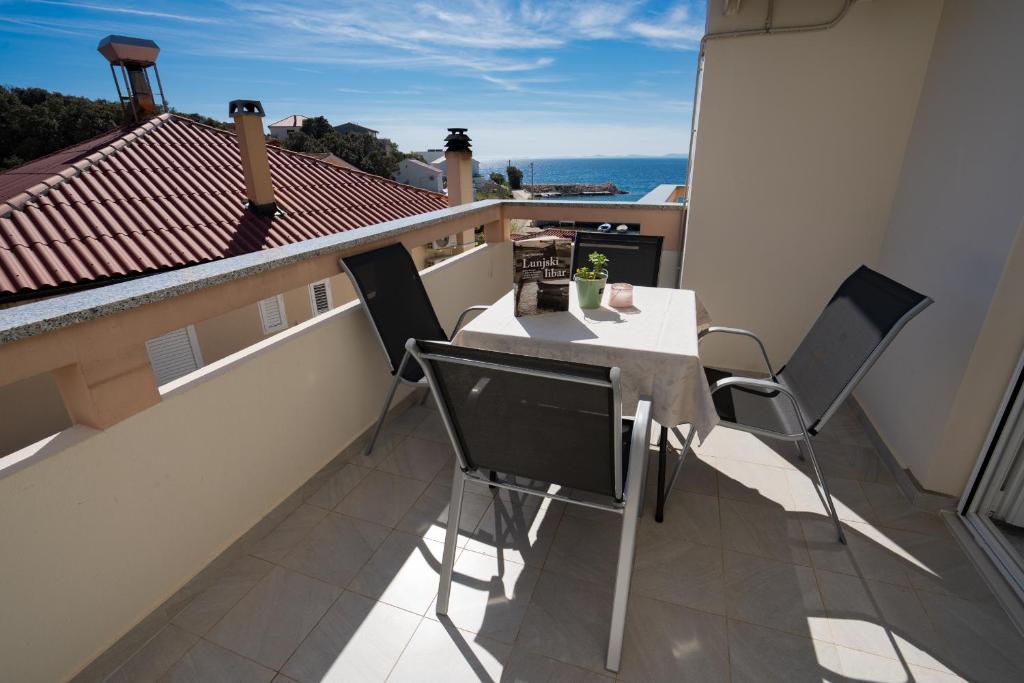 Balkon lub taras w obiekcie Apartments and rooms LJUBICA