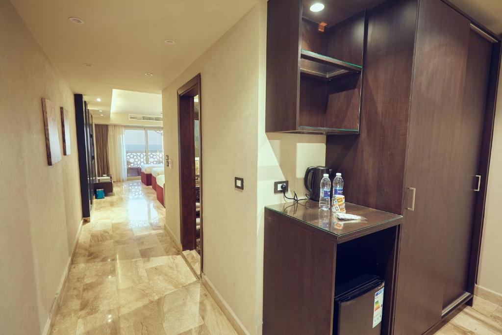 A kitchen or kitchenette at Grand Hotel Port Said
