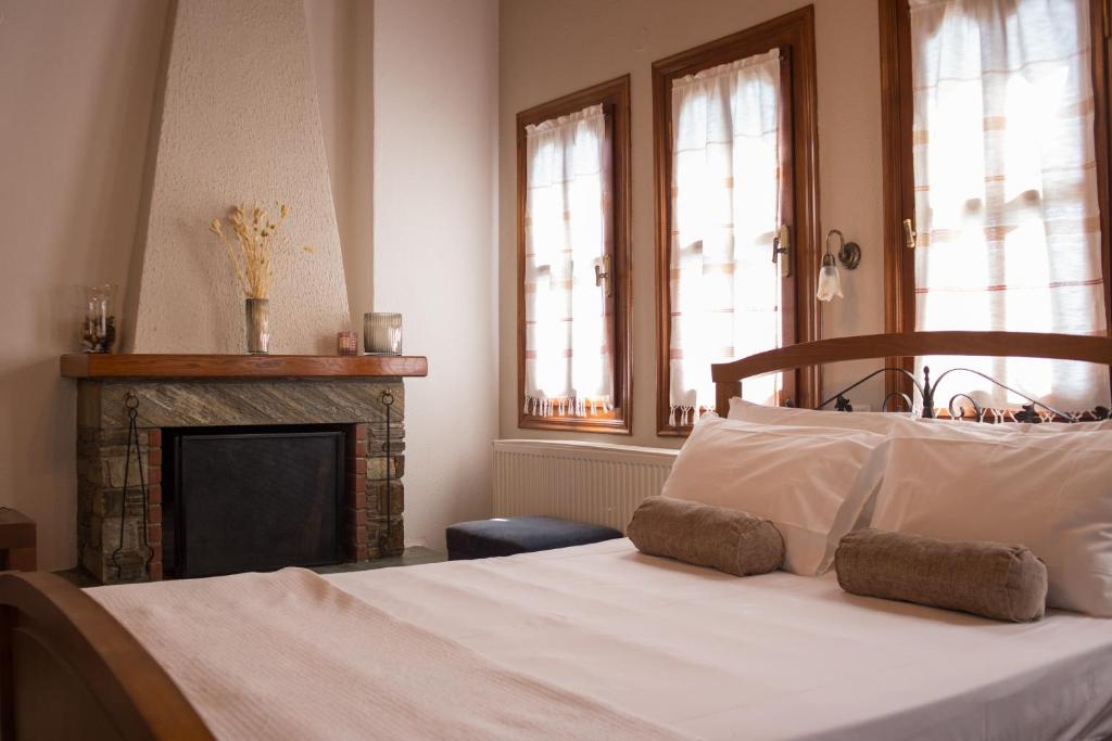 Postel nebo postele na pokoji v ubytování Φιλυρέα Apartments - Room 3