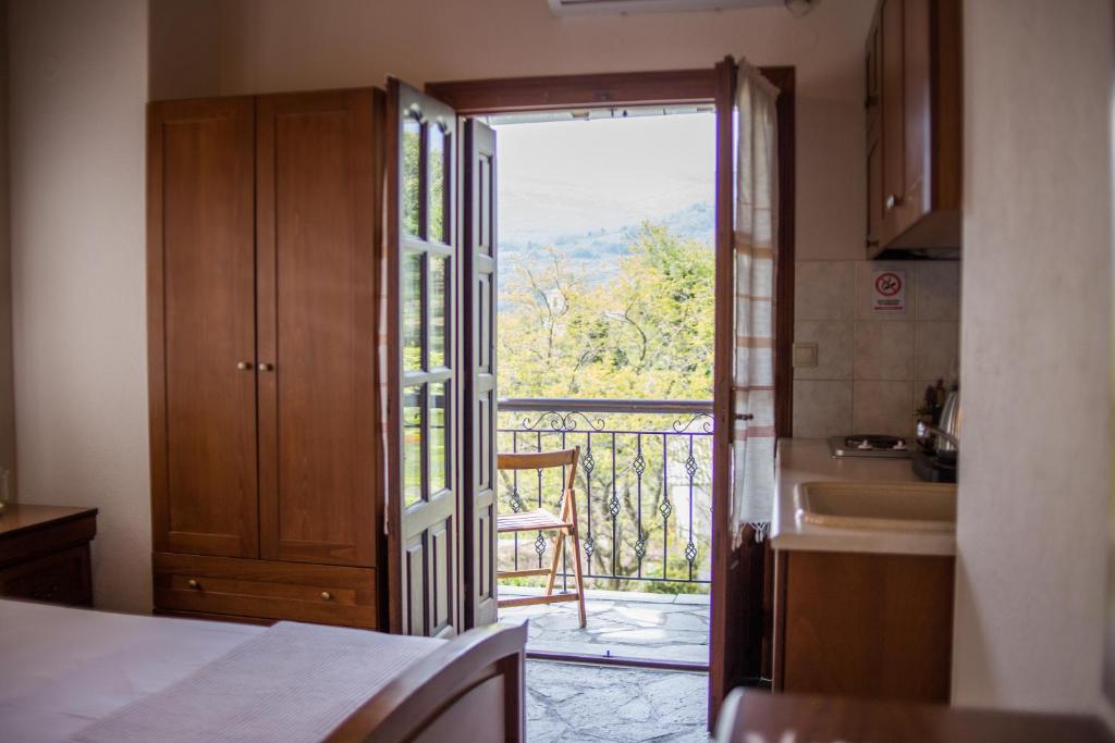 Postel nebo postele na pokoji v ubytování Φιλυρέα Apartments - Room 3