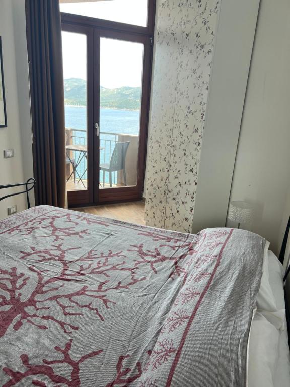 Postel nebo postele na pokoji v ubytování L'angolo di Filo