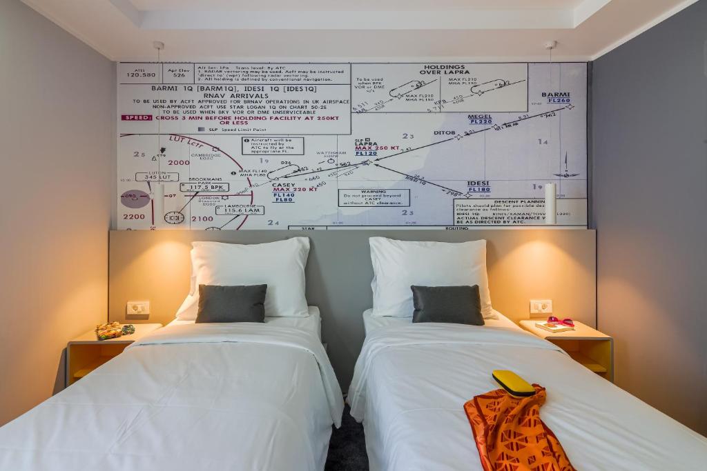 Postel nebo postele na pokoji v ubytování Ibis Styles Bucharest Airport