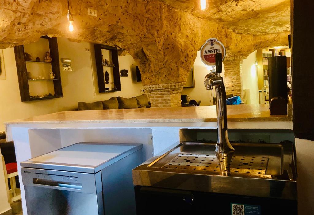 Kuchyň nebo kuchyňský kout v ubytování Casa rural cueva El Nido