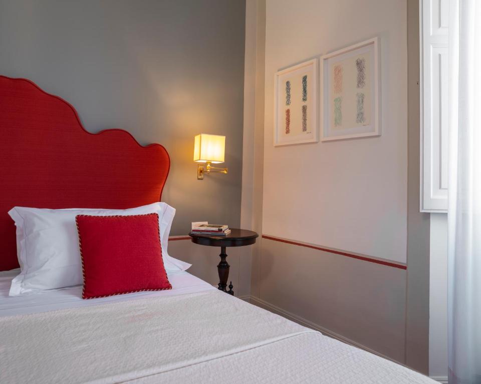 Postel nebo postele na pokoji v ubytování Albergo Pietrasanta