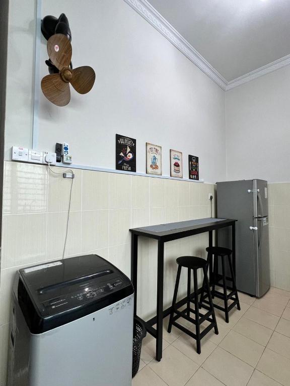 Kuchyň nebo kuchyňský kout v ubytování Casa Indah Guest House, Melaka