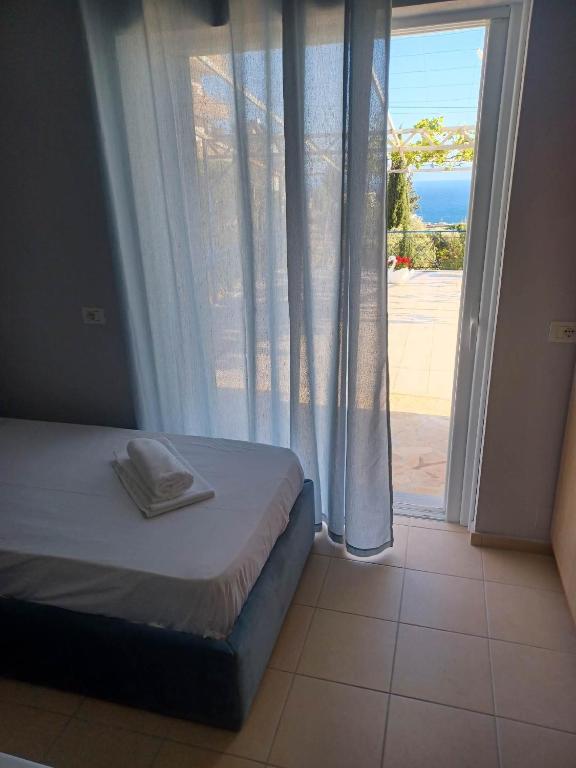 Postel nebo postele na pokoji v ubytování Ionian View Guest House