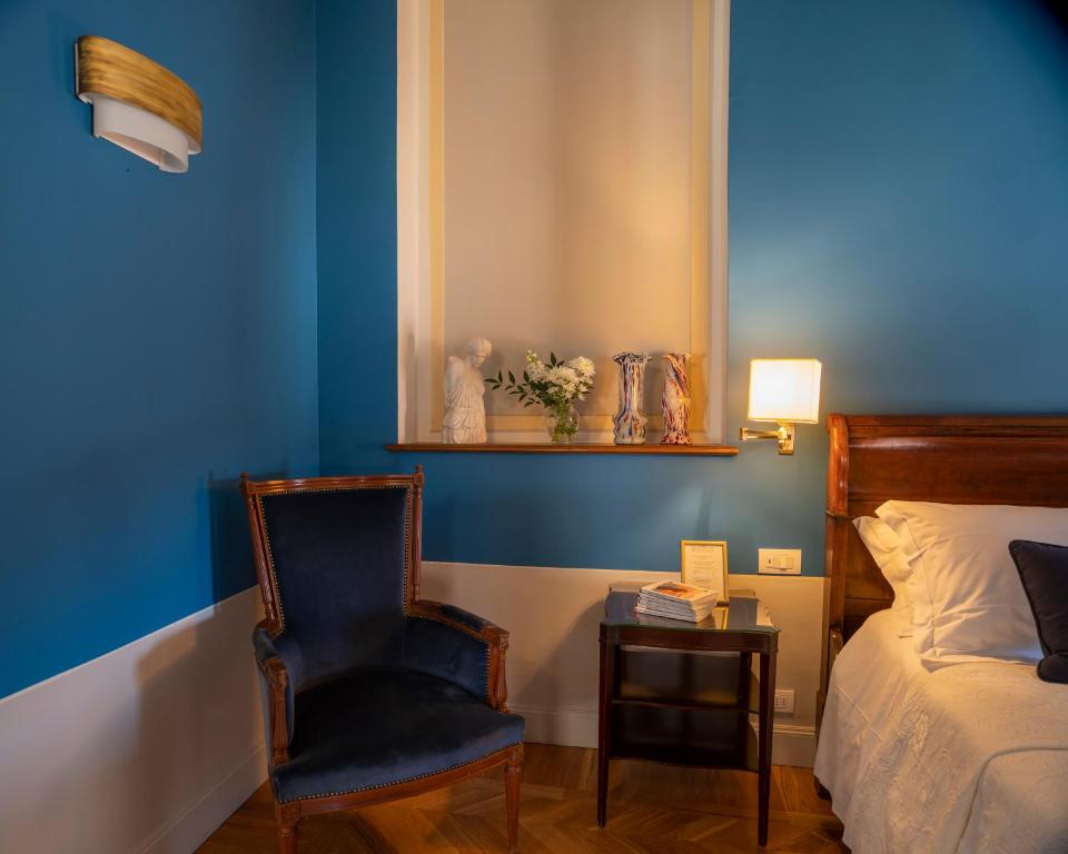Postel nebo postele na pokoji v ubytování Albergo Pietrasanta
