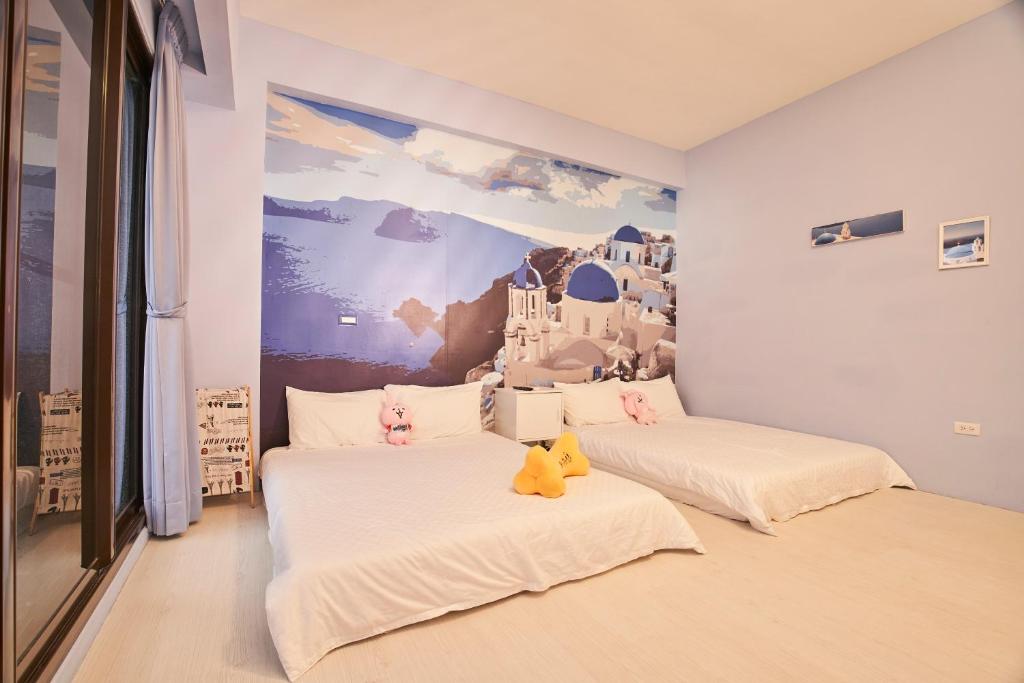 Postel nebo postele na pokoji v ubytování Ching Yu Rou B&B