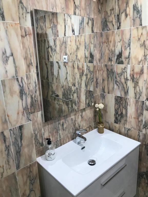 Kúpeľňa v ubytovaní Apartamentos Laguna Beach 2