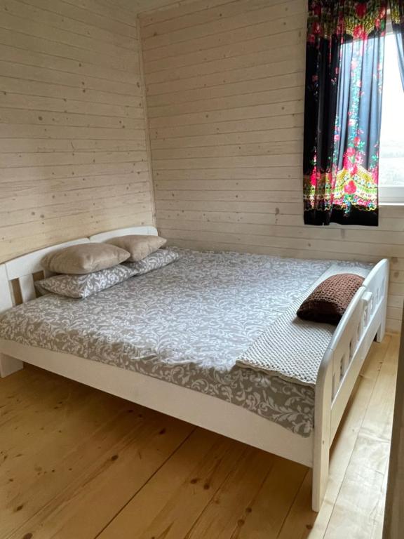 Postel nebo postele na pokoji v ubytování Somnium Pieniny