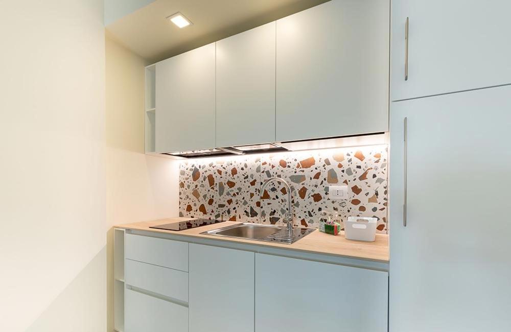 A kitchen or kitchenette at Hotel Carducci